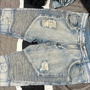 Distressed Light Blue Jeans
